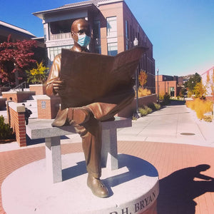 Richard H. Bryan statue at University of Nevada, Reno, wearing a medical mask. 